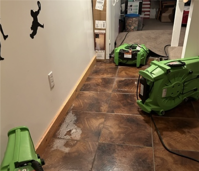 Drying equipment on floor.